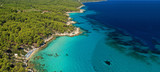 Aerial drone ultra wide photo of beautiful exotic paradise rocky turquoise beach in Caribbean island destination