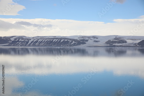Sky reflection in the water surface of Arctic ocean around Spitsbergen, Svalbard