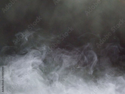 smoke on black background design concept in smoke white on dark