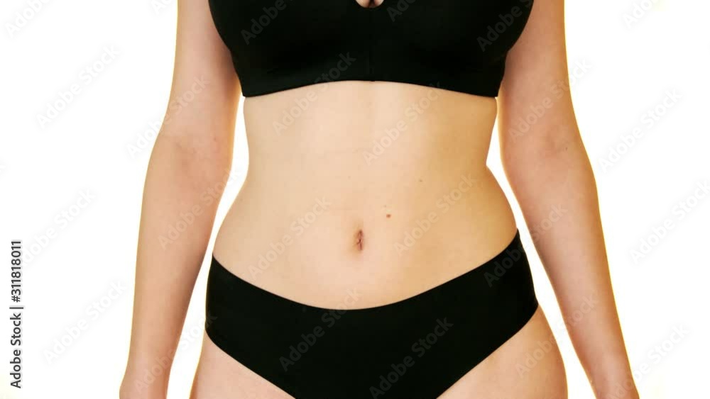 Beautiful slim body of woman isolated on white background Beautiful slim body of woman isolated on white background