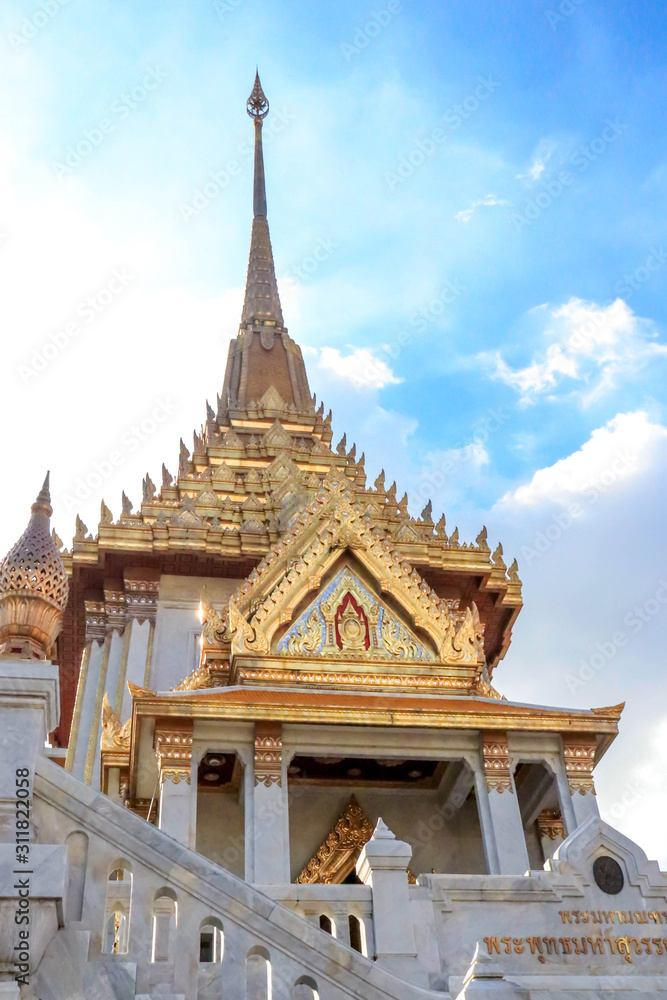 A beautiful view of Wat Traimit temple in Bangkok, Thailand. A beautiful view of Wat Traimit temple in Bangkok, Thailand.