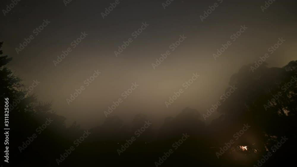 Timelapse of Night Sky with Passing Clouds and Fog Timelapse of Night Sky with Passing Clouds and Fog