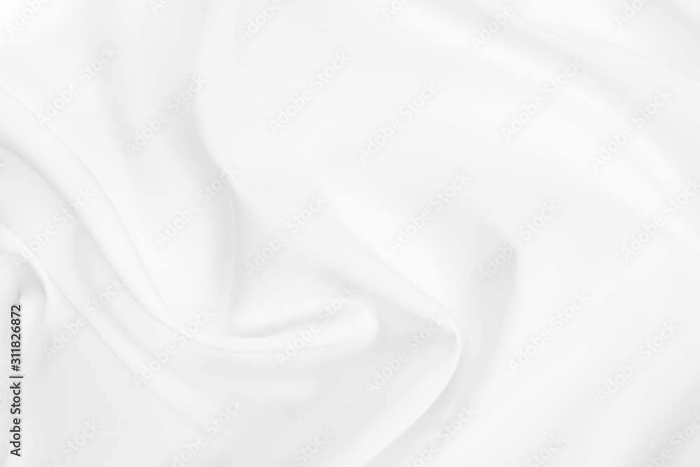 Abstract white fabric texture background. Cloth soft wave. Creases of satin, silk, and cotton.	