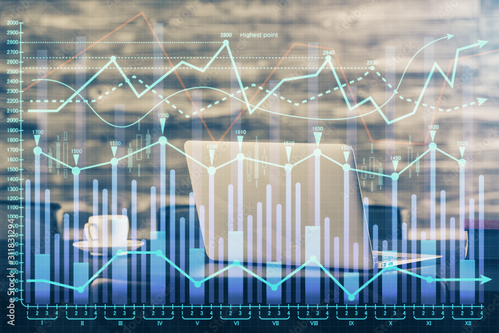 Financial graph colorful drawing and table with computer on background. Double exposure. Concept of international markets. Financial graph colorful drawing and table with computer on background. Double exposure. Concept of international markets.