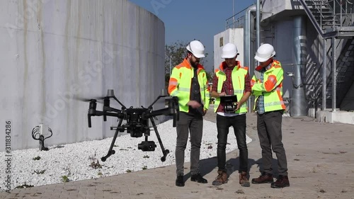 Industrial drone operators on work site