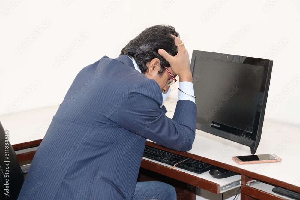 Young Man with computer and Mobile Young Man with computer and Mobile