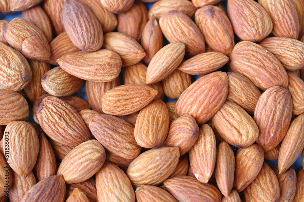 Almonds background. Almond Food or ingredient concept with copy space Almonds background. Almond Food or ingredient concept with copy space
