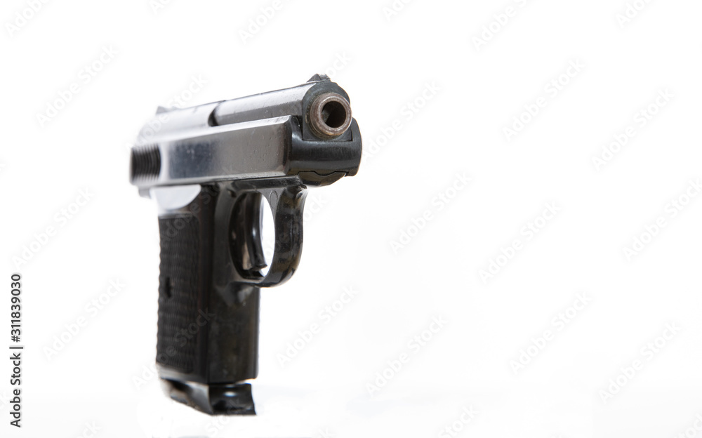 Handgun isolated against white background, closeup view Handgun isolated against white background, closeup view