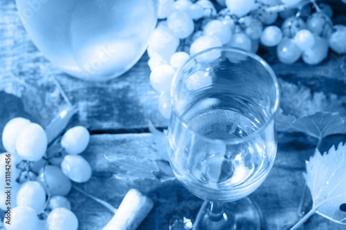 Wallpaper Mural Classic blue 2020. Gradient color palette. Wine background. Wine in glasses, bottle, grapes on vintage background, wine concept. Torontodigital.ca