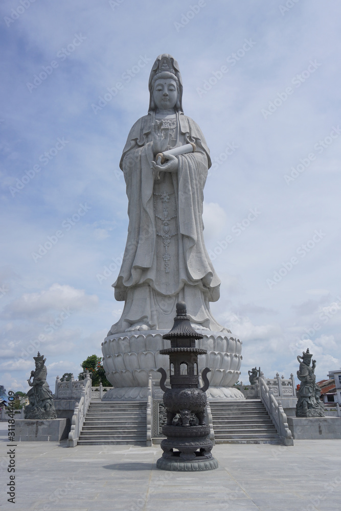 Fototapeta premium Statue of Goddess Kwan Im 22.8 meter high statue was founded in Vihara Avalokitesvara in downtown Siantar, located in Jalan Siposo-Poso. 