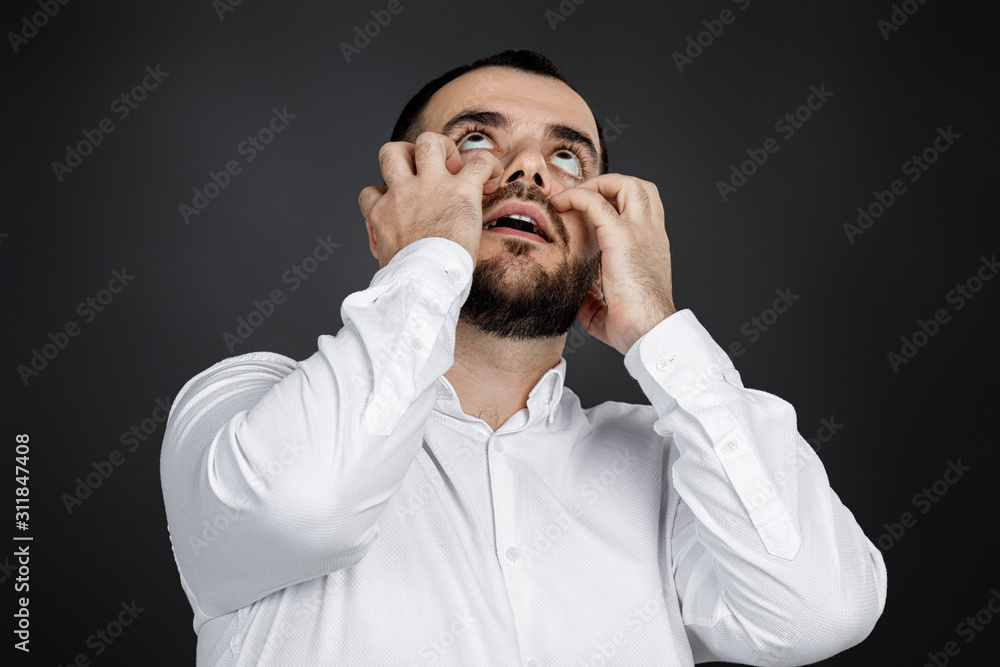 bearded man keeps hand on head on black background. man forget about something. Oh, my God bearded man keeps hand on head on black background. man forget about something. Oh, my God