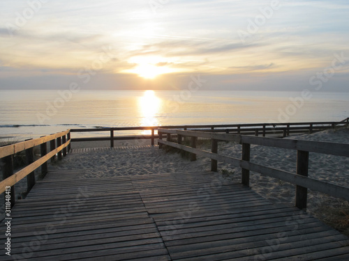 Sunset on Lacanau beach wooden path medoc ocean france