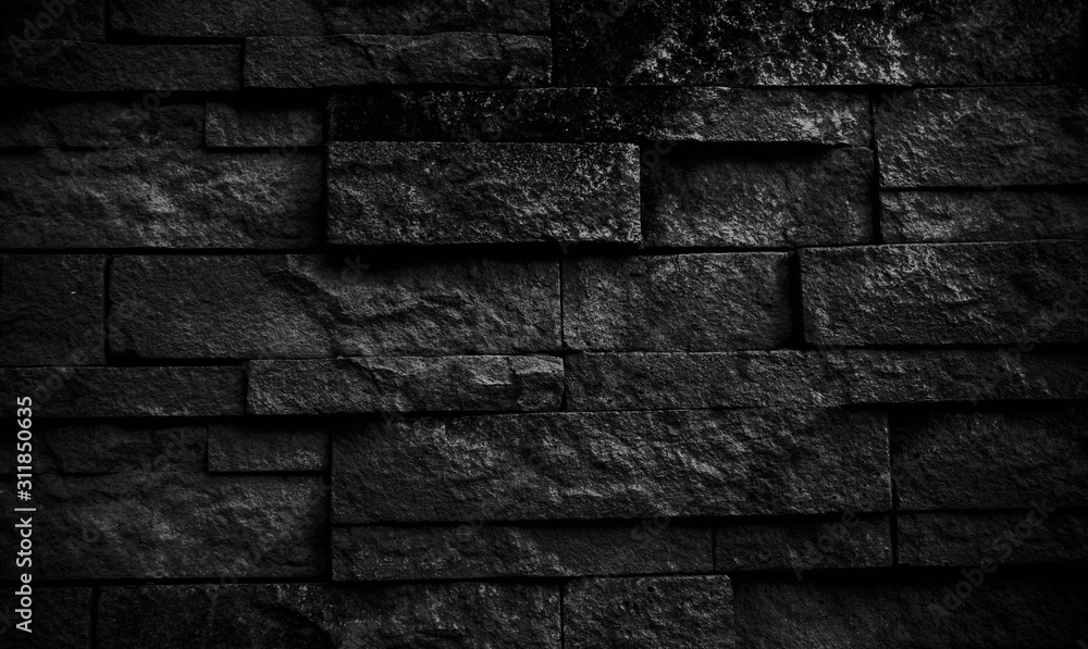 black stone blocks background. Stones texture. The wall of stones.black