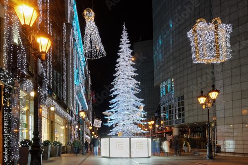 Budapest, Hungary Christmas Market & illuminated tree at Fashion Street. Advent Feast festive decorations at pedestrian area with prestigious shops expanding up to Deak Ferenc UTCA