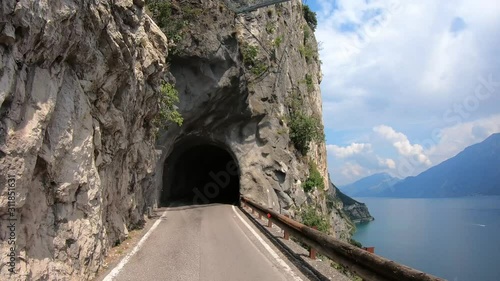 Garda lake, Italy. Driving along the Strada della Forra, one of the most scenic and famous drives in the world. Winston Churchill defined it as the eighth wonder of the world. Driver point of view