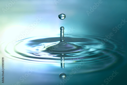 waterdrop on metallic blue blury background