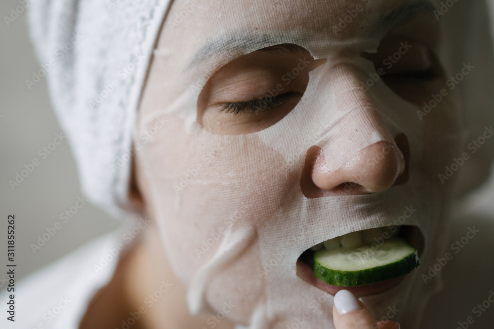 Anti wrinkles and healing of the skin of the face. Buti mask. Woman