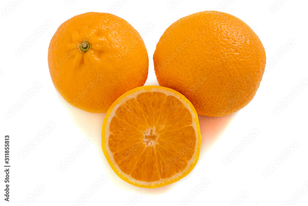 Three oranges isolated on a white background. Fresh citrus fruits. Three oranges isolated on a white background. Fresh citrus fruits.