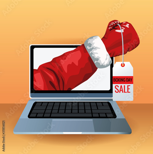 boxing day sale poster with laptop and glove