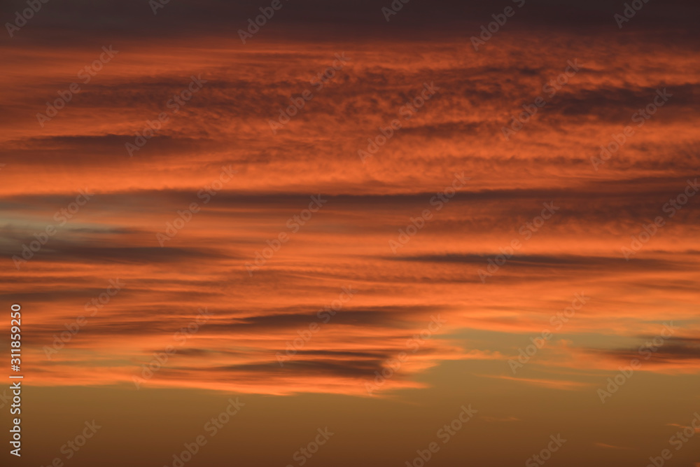 Texture of orange clouds at sunrise