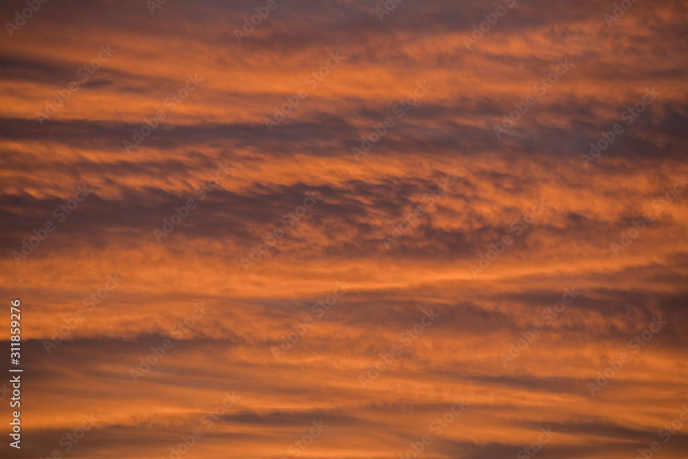 Texture of orange clouds at sunrise