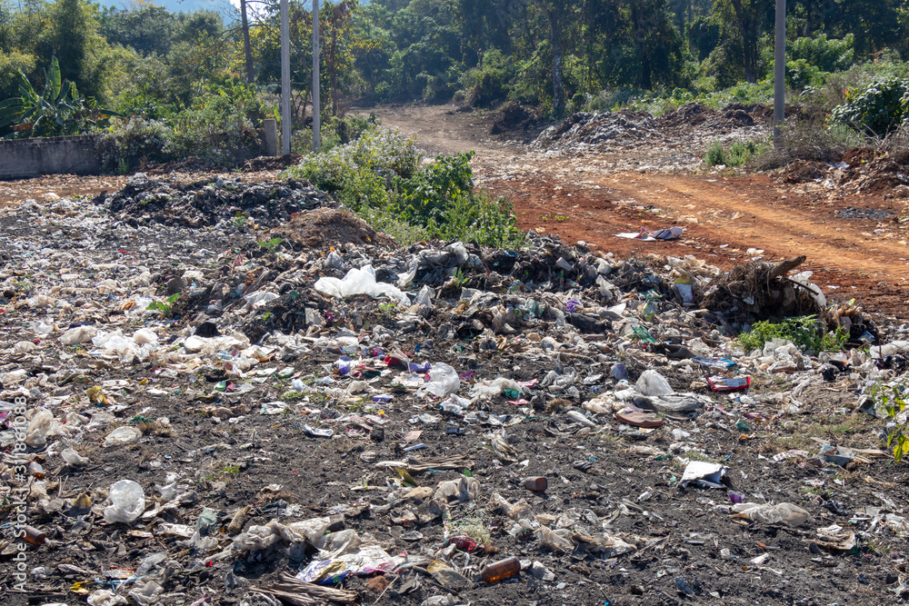 Waste from household in wasted landfill, waste disposal in dumping site in Myanmar, 26 December 2019, Shan State, Myanmar. Pollution concept.