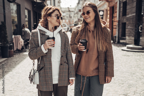 Portrait of Two Fashion Girls, Best Friends Outdoors, Coffee Break Lunch