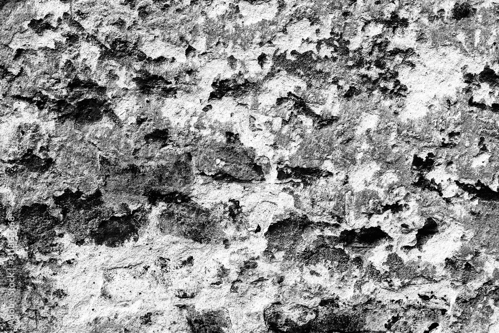 Obraz premium Texture of a brick wall with cracks and scratches which can be used as a background