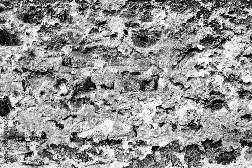 Texture of a brick wall with cracks and scratches which can be used as a background