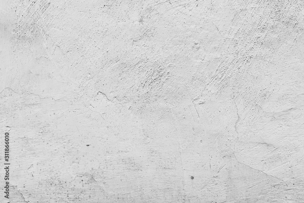 Fototapeta premium Texture of a concrete wall with cracks and scratches which can be used as a background