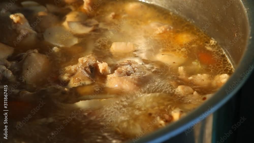 Boiling chicken or Tom Kha Gai soup, Thai famous food Boiling chicken or Tom Kha Gai soup, Thai famous food