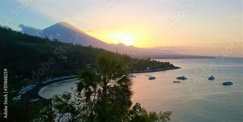 Fototapeta Naklejka Na Ścianę i Meble -  Beautiful Sunset in the bay of Amed, vulcano sea sun beach Bali, Indonesia