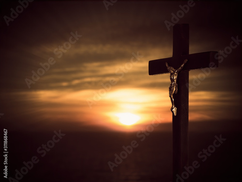 Christian inspirational background. Crucifix, cross over dark night dawn landscape background. Maybe religious Easter.