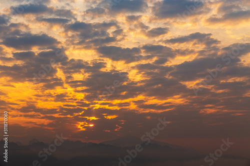 Beautiful sunrise on mountain. sky and cloudscape at sunrise. Sunrise in Thailand.