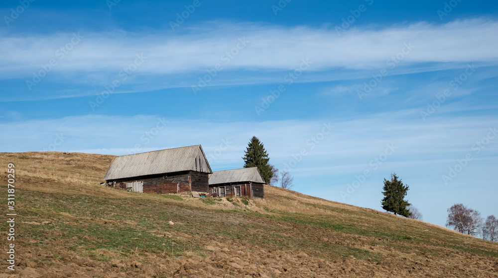 Romanian old sheepfold on the top of the hill in the fall season, Fantanele village, Sibiu county, Cindrel mountains, 1100m, Romania Romanian old sheepfold on the top of the hill in the fall season, Fantanele village, Sibiu county, Cindrel mountains, 1100m, Romania
