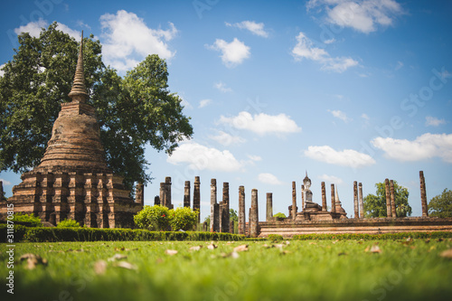 Buddha statue and pagoda in Sukhothai historical park  world heritage site in Thailand.
