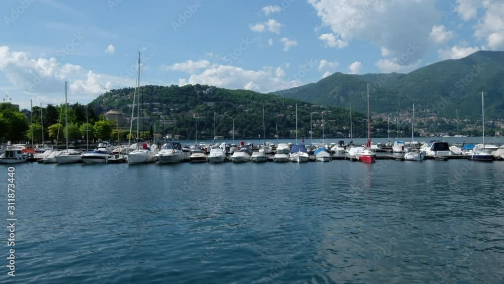 Como, Italy. Lake panorama from pier. Dock of the bay Como, Italy. Lake panorama from pier. Dock of the bay