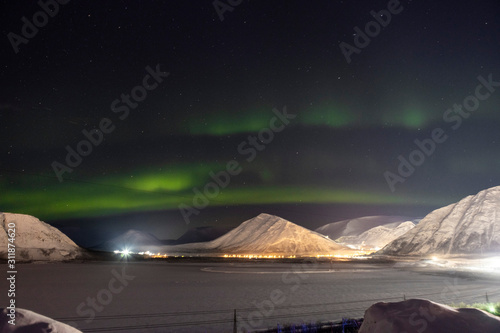 Northern lights on the background-night mountains