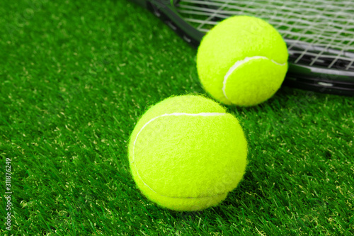 Tennis balls on  grass close up. Tennis equipment © fotofabrika