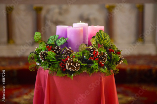 Closeup on advent crown with pink candles