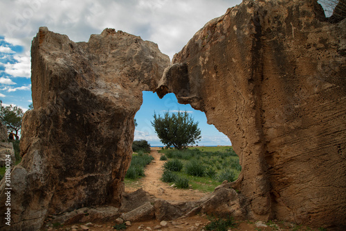 Picturesque view through old ruined arch in Cyprus © Oleksandra