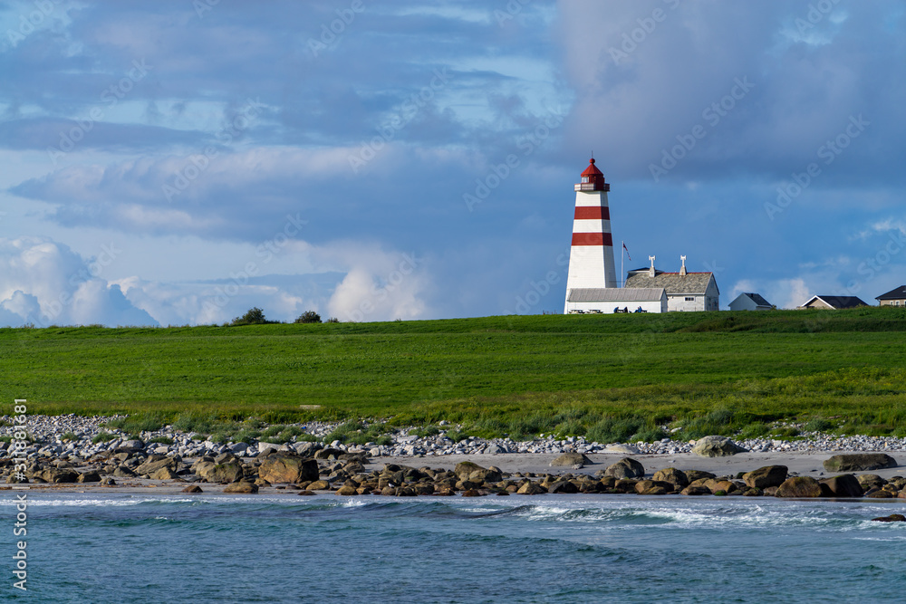 The lighthouse of Alnes, Godoy island, on the west coast of Norway.