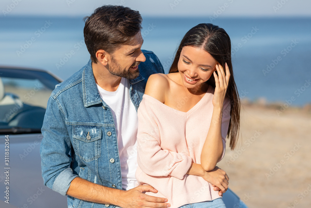front view of cheerful couple in love spending time together front view of cheerful couple in love spending time together