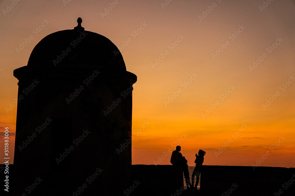 Silhouettes at sunset in Cartagena, Colombia