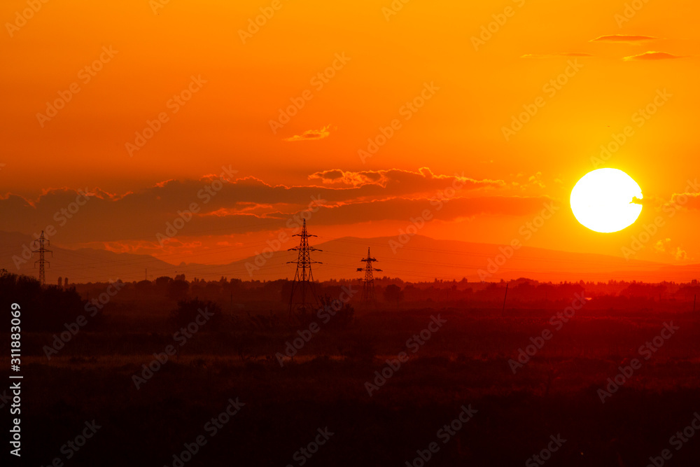 Panoramic view in beautiful orange sunset 