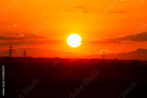 Panoramic view in beautiful orange sunset 