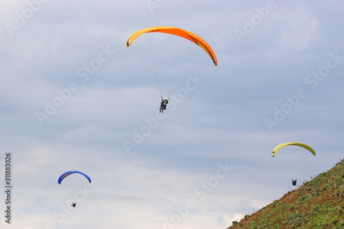 Paragliders flying above Rhossili 