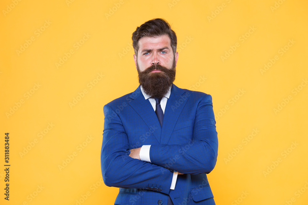 Looking smart at work. Confident businessman. Businessman keep arms crossed. Elegant businessman yellow background. Bearded man in formalwear. Professional businessman with beard and stylish hair Looking smart at work. Confident businessman. Businessman keep arms crossed. Elegant businessman yellow background. Bearded man in formalwear. Professional businessman with beard and stylish hair