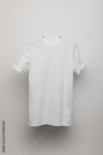 blank basic grey t-shirt on grey background