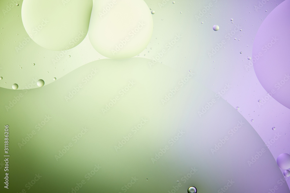 Beautiful abstract background from mixed water and oil in light green and  purple color Stock Photo | Adobe Stock
